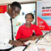 An Airtel Uganda customer care advisor attends to a customer