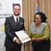 Ms Christine Guwatudde Kintu (Right), the Permanent Secretary at the Office of the Prime Minister (OPM), congratulates Mr Mathias Kamp, the country director of Konrad-Adenauer-Stiftung, one of the grantees shortly after signing the DINU grants contract at the OPM in Kampala on January 14, 2020.