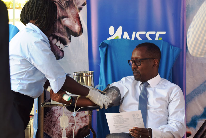 NSSF Managing Director, Richard Byarugaba donates blood during the 2018 edition of the NSSF Blood Drive- the fund's social initiative that has raised 21,425 since 2012. This year, the fund aims to raise at least 15,000 units so as to end the cyclic blood shortage in the December-January period.