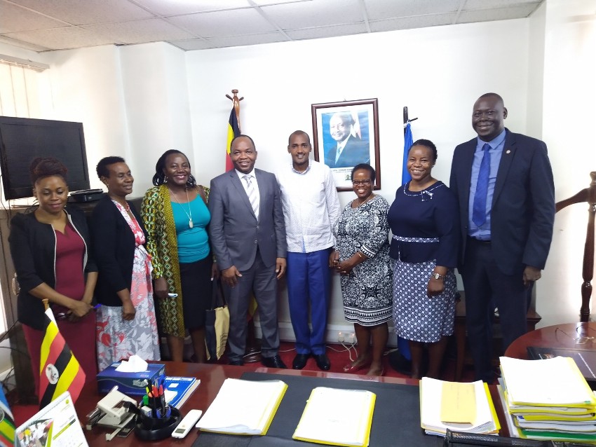 UN Women Country Representative, Dr. Maxime Houinato and Minister for Gender, Labour and Social Development Frank Tumwebaze after the meeting at the Ministry headquarters on Wednesday