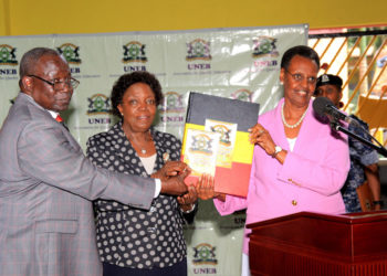 L-R: UNEB Executive Secretary Dan Odongo, UNEB Chairperson Prof Mary Okwakol and Education Minister Janet Museveni releasing the 2019 PLE results