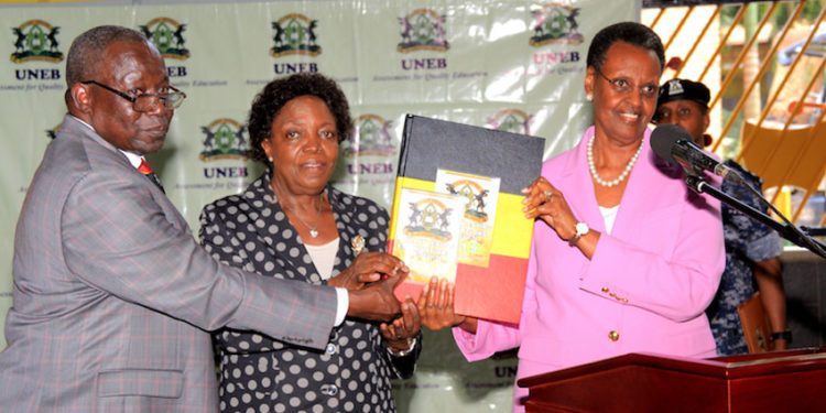 L-R: UNEB Executive Secretary Dan Odongo, UNEB Chairperson Prof Mary Okwakol and Education Minister Janet Museveni releasing the 2019 PLE results