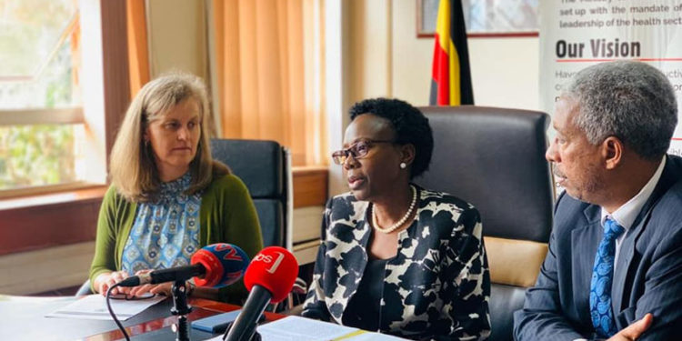 Health Minister Dr Jane Ruth Aceng [m] addressing the media on Friday