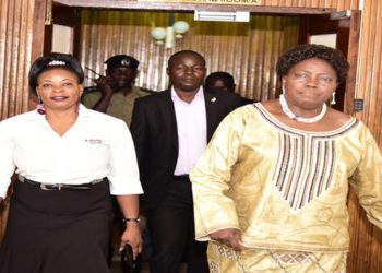 Kadaga (R) with the Fund Manager, Mirember after the closure of the meeting