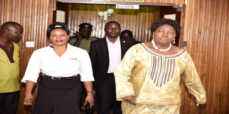 Kadaga (R) with the Fund Manager, Mirember after the closure of the meeting