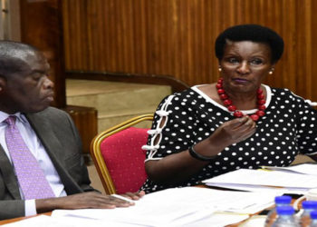 Amelia Kyambadde (R) with State Minister for Industry, Hon Michael Werikhe appearing before the Committee on Trade