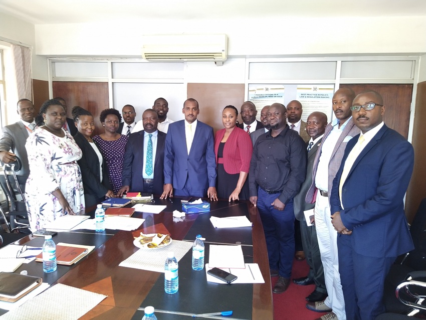 Ministers Frank Tumwebaze and Mwesigwa Rukutana with executive members of UAERA after the meeting on Tuesday