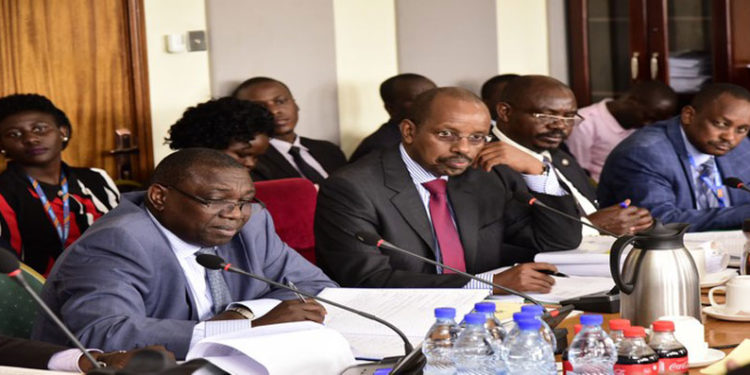 The Accountant General, Lawrence Semakula( L) and Secretary to the Treasury, Keith Muhakanizi (to his left) appearing before PAC-Central