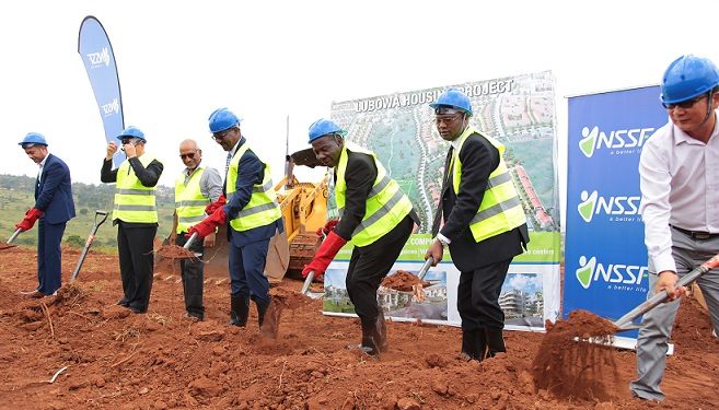 Richard Byarugaba, the NSSF MD (Centre) during the ground breaking of the Lubowa housing project