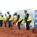 Richard Byarugaba, the NSSF MD (Centre) during the ground breaking of the Lubowa housing project