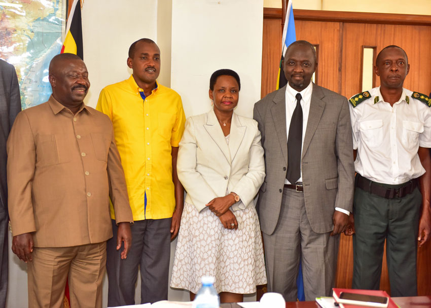 Minister Tumwebaze (middle) with Lt Col Edith Nakalema, the head of State House Anti Corruption Unit