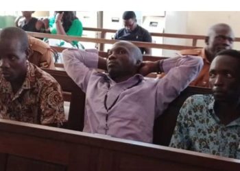 Brian Bagyenda (R) in Court