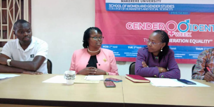 Associate Professor Consolata Kabonesa, the principal investigator of the Gender Mainstreaming project [m] and Associate Professor Sarah Ssali, the Dean School of Women and Gender [r] addressing the media on Saturday