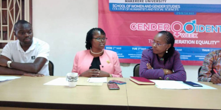 Associate Professor Consolata Kabonesa, the principal investigator of the Gender Mainstreaming project [m] and Associate Professor Sarah Ssali, the Dean School of Women and Gender [r] addressing the media on Saturday