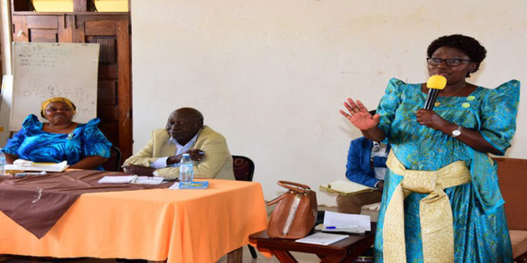 Speaker Kadaga (R) addressing the leadership of Kamuli district