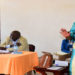 Speaker Kadaga (R) addressing the leadership of Kamuli district