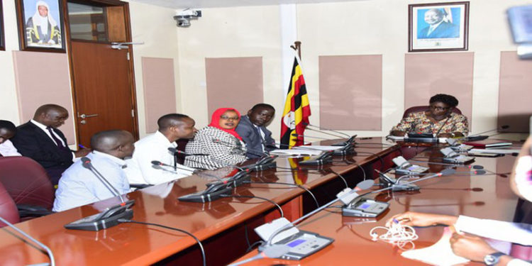 The Speaker (R) meeting lawyers who studied in Rwanda and are seeking admission to the Bar in Uganda