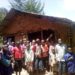 Some of the pupils infront of one of the ramshackle structures at Murungu Primary School