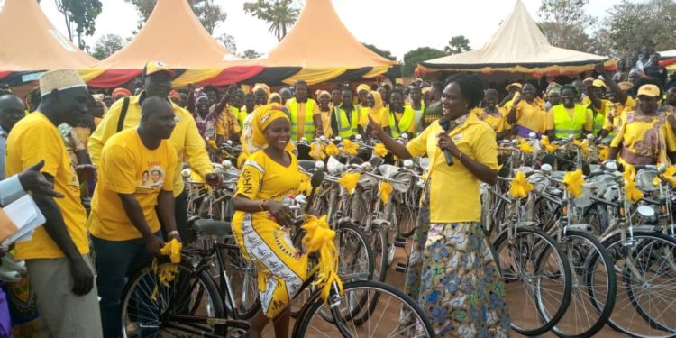 Minister Anite handing over bicycles to Women Council leaders