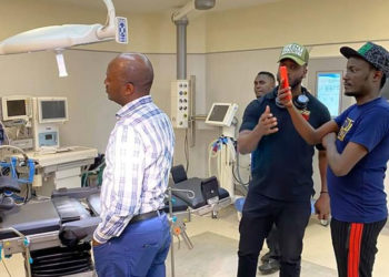 Bebe Cool and Andrew Mwenda inspecting Mulago Hospital a few days ago