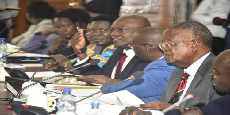 Kamuntu(R) appearing before the Committee on Legal and Parliamentary Affairs