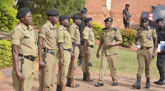 Police chief Ochola inspects a police parade