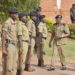 Police chief Ochola inspects a police parade