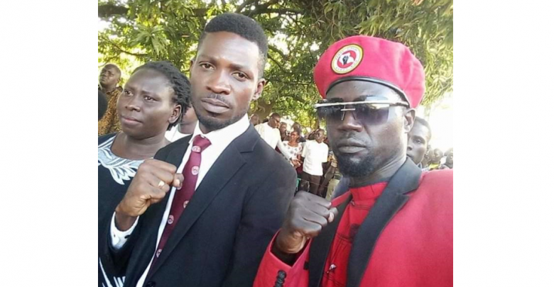 Bosmic Otim and Bobi Wine in happier times