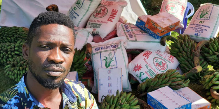 Bobi Wine with his rejected food relief