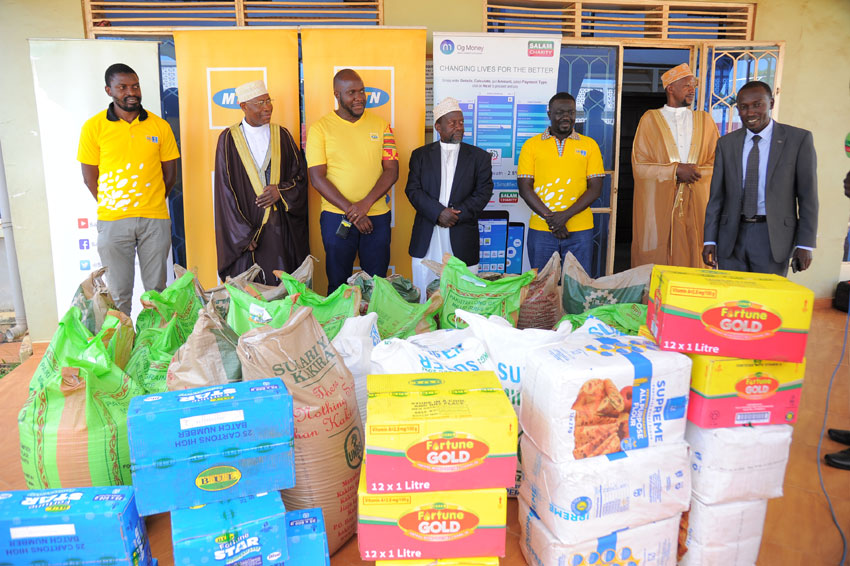 MTN staff hand over food items to the Supreme Mufti Kasule Ndirangwa at Kibuli Mosque