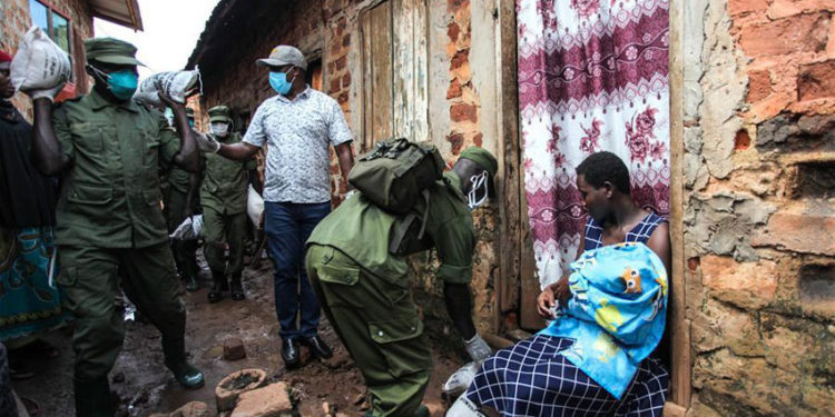 A woman receiving food relief a few days ago