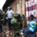 A woman receiving food relief a few days ago