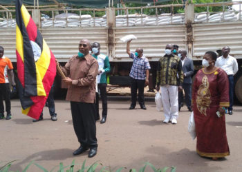 PM Rugunda flagging off food distribution in Kampala recently