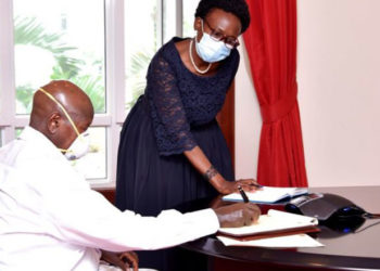 President Museveni with Health Minister Jane Ruth Aceng