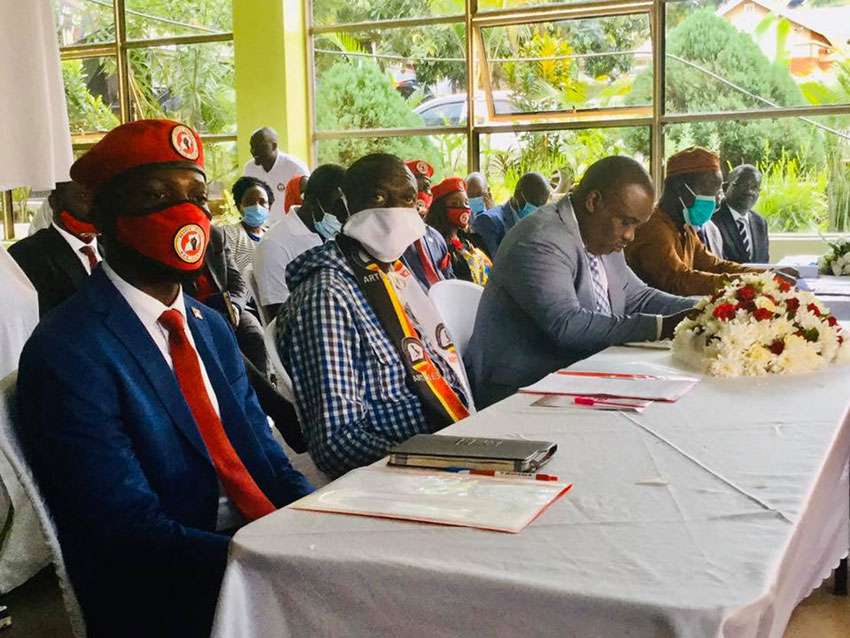 Bobi Wine and Dr Kizza Besigye during a meeting at Rose Gardens Wakiso