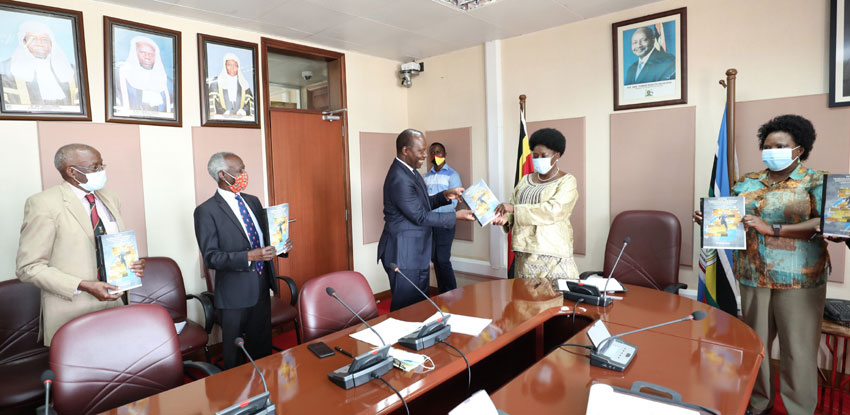 Activists led by Mr Apollo Makubuya handing in their petition to Speaker of Parliament Rebecca Kadaga