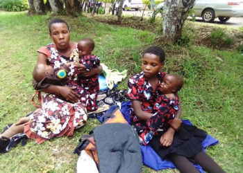 Niwandinda with her triplets at Kabale district headquarters