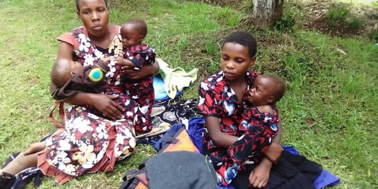 Niwandinda with her triplets at Kabale district headquarters
