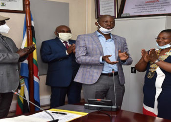 Deputy Speaker, Jacob Oulanyah (left) presides over the installation of Sheila Naturinda (right) as President of the Rotary Club of Kampala Central. PDG Ken Mugisha installed Naturinda. (2nd left) is Charles Lwanga Kiiza, the outgoing President of the Club