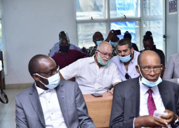 Dr Sudhir Ruparelia with his son Rajiv Ruparelia in court recently