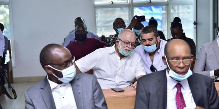 Dr Sudhir Ruparelia with his son Rajiv Ruparelia in court recently