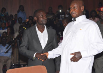 Ronald Mayinja with President Yoweri Museveni in 2019