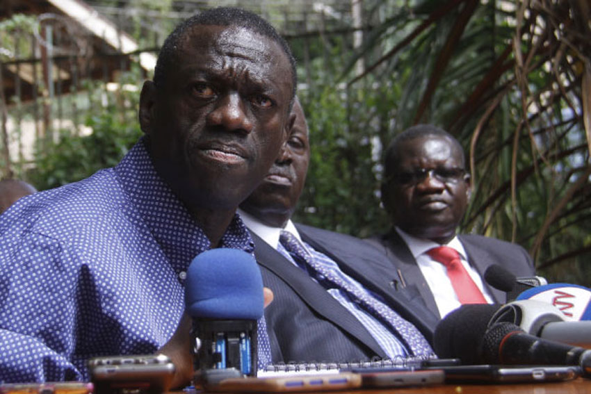 Dr Kizza Besigye and  Patrick Oboi Amuriat (extreme right)