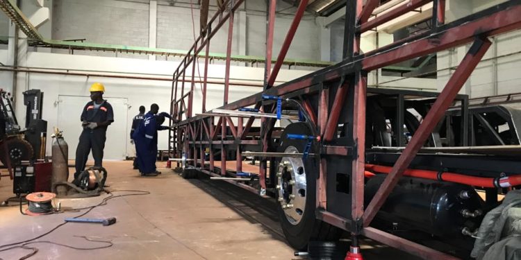 Kiira Motors engineers working on the Kayoola EVS Bus at Luweero Industries in Nakasongola Baracks