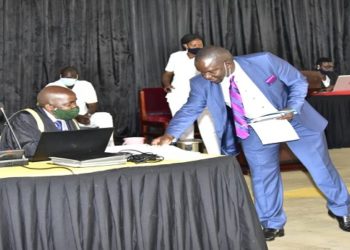 Mwiru(R) lays the bill on table after it's First Reading