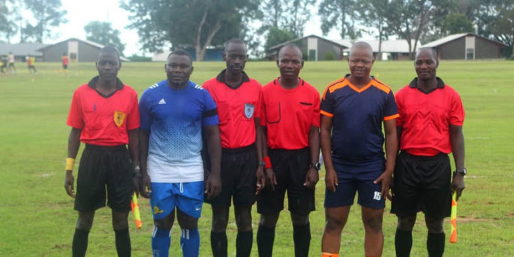 Michael Ssekabira in blue jersey