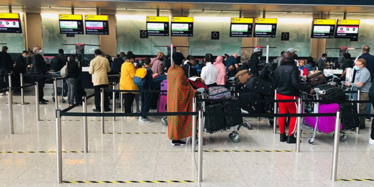 Ugandans at London Heathrow Airport on Wednesday