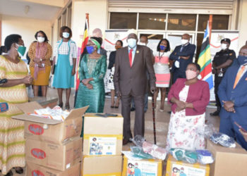 Moses Ali, the First Deputy Prime Minister(C) flags off a consignment of face masks that were to be distributed in some parts of the country on June 11