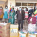 Moses Ali, the First Deputy Prime Minister(C) flags off a consignment of face masks that were to be distributed in some parts of the country on June 11