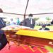 Rt Hon. Jacob Oulanyah, the Deputy Speaker of Parliament, laying a wreath on the casket containing Odida's remains in Pader district